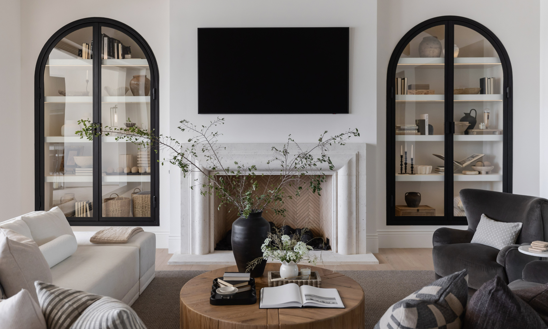 No Place Like Home Project Living Room and Fireplace Between Arched Shelves