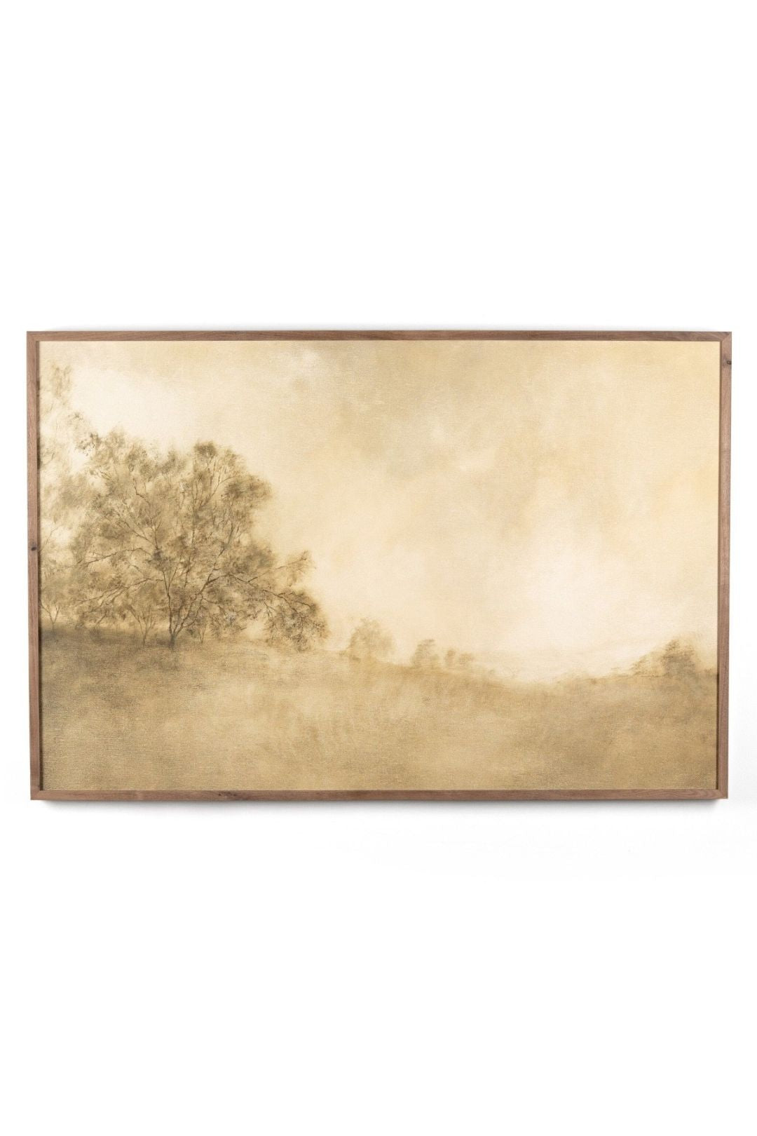 Framed landscape wall art with a tree and misty field on a white background