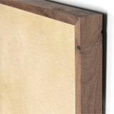 Close-up of a wooden frame corner of landscape wall art piece with a white background