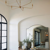 nottaway large modern chandelier for high ceilings in an entry way hall with a bench and large mirror